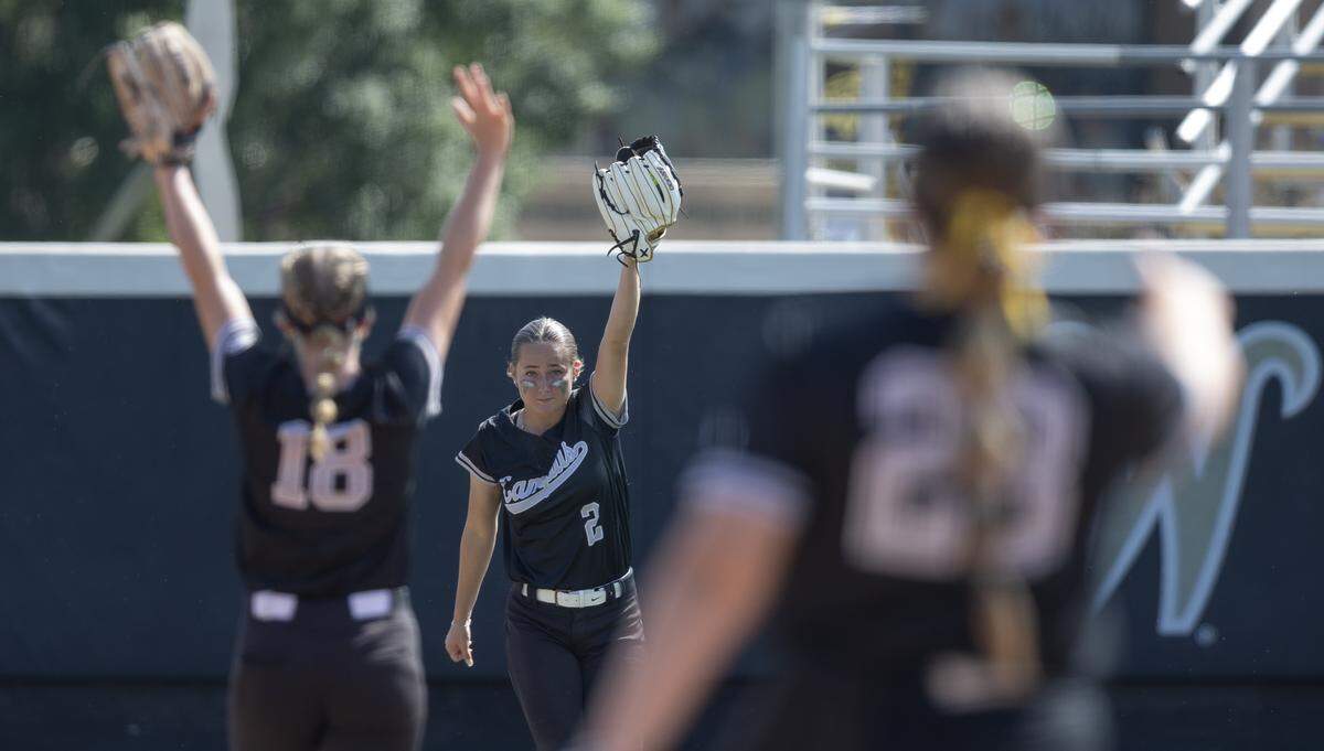 Campus senior outfield Madi Harris shows off a catch during the Colts’ 7-2 win over Mill Valley in the Class 6A semifinals at Wilkins Stadium on Friday.
