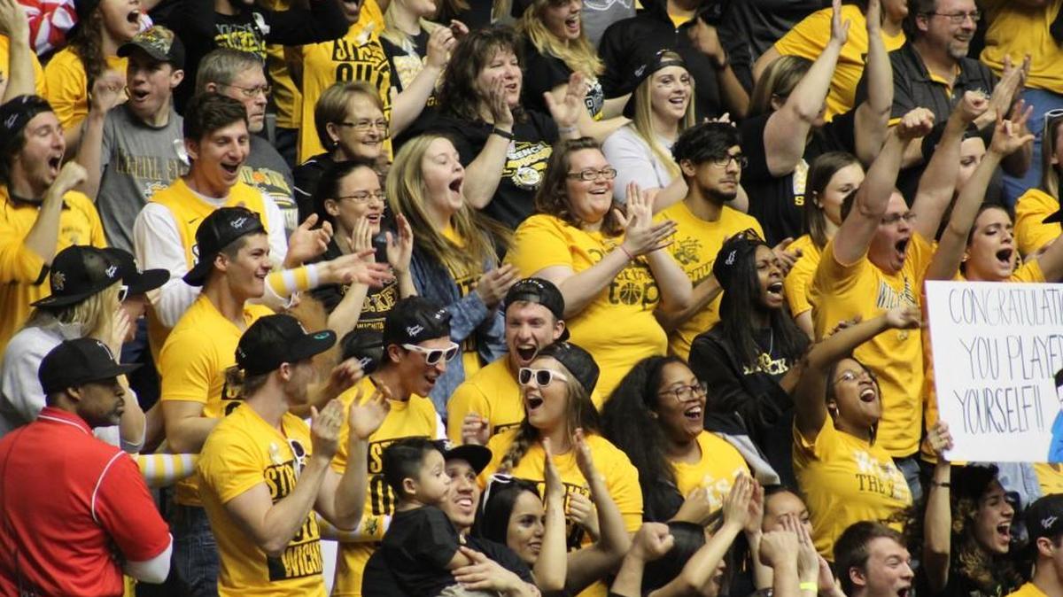 Wichita State students celebrate during the team’s 74-58 win over Illinois State on Senior Day.