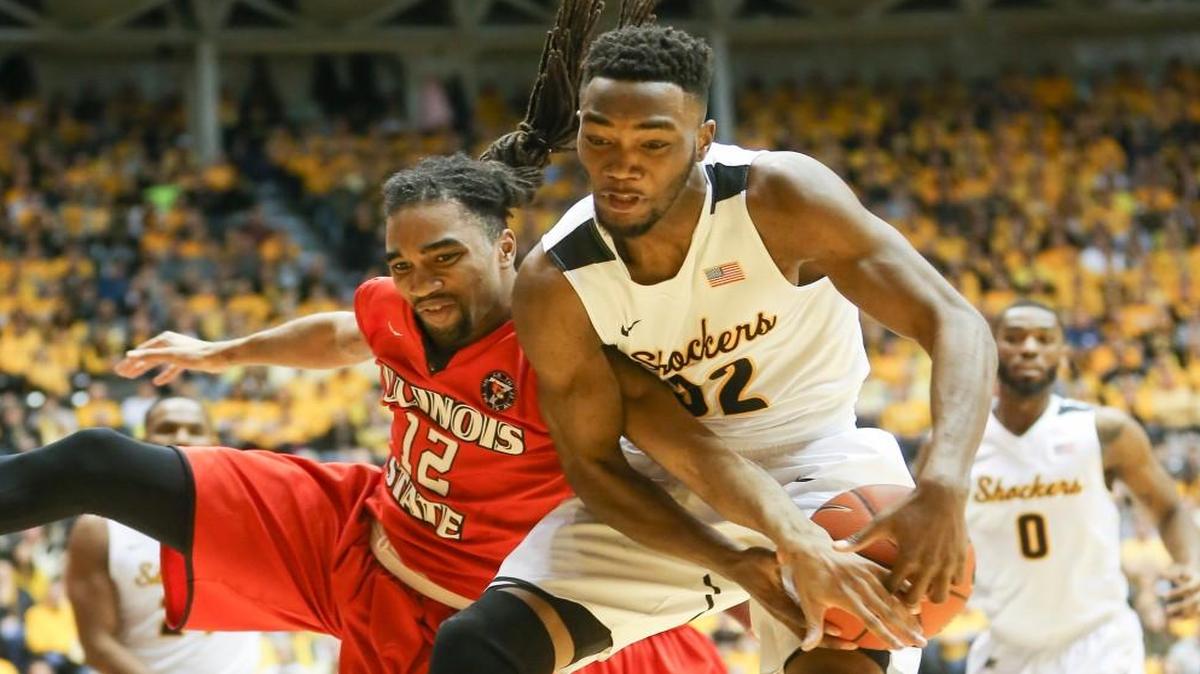 Wichita State forward Markis McDuffie fights for a rebound against Illinois State guard Tony Wills during the first half Saturday at Koch Arena.