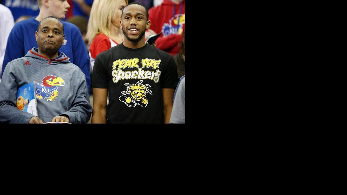 
Wichita State fans and Kansas fans during the Kansas and New Mexico NCAA Tournament game Friday at CenturyLink Center in Omaha. 
