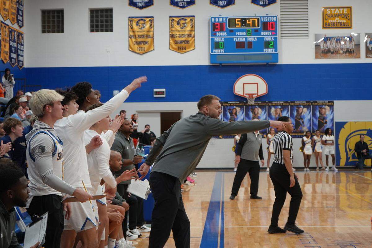 First-year head coach Nate Schmitt has the Collegiate boys basketball team off to an undefeated start at 6-0 so far this season.