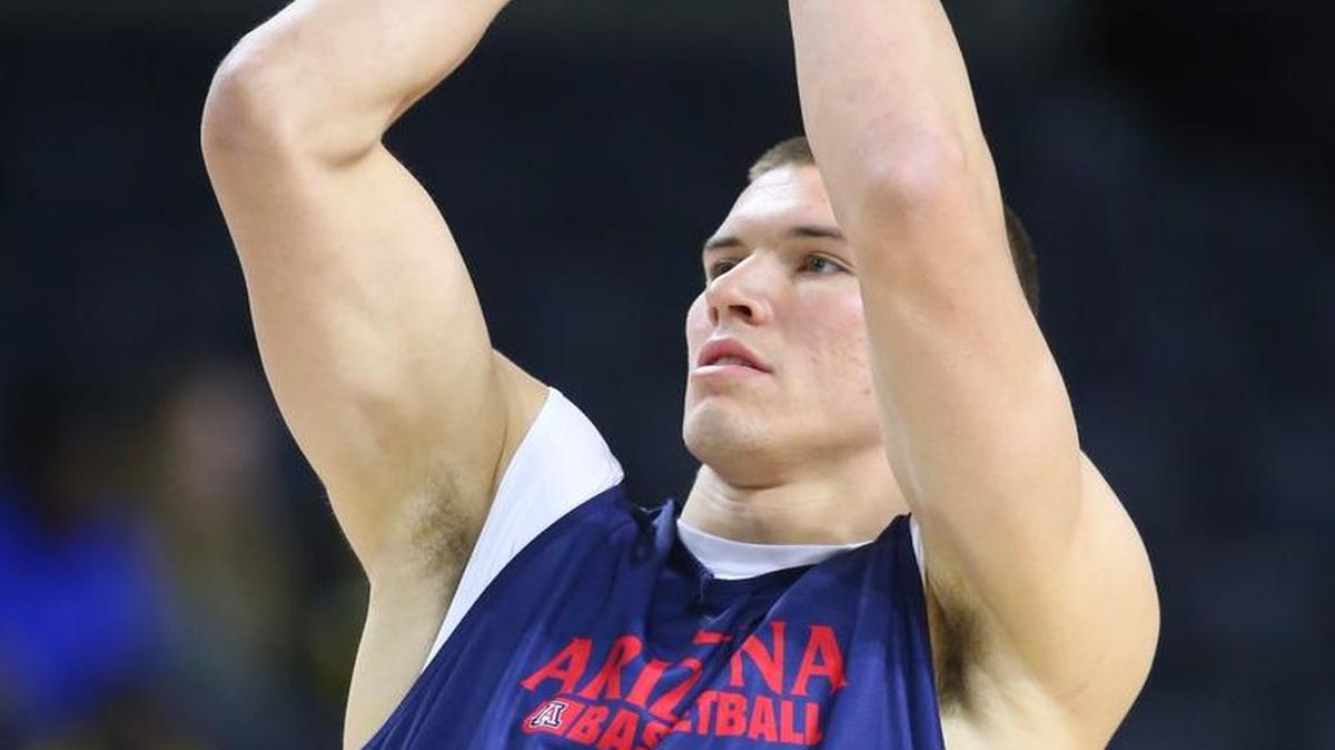 Arizona's Kaleb Tarczewski shoots during practice at the Dunkin Donuts Center in Providence, R.I., on Wednesday. He’s one of the Arizona post players Wichita State will have to control in Thursday’s game.