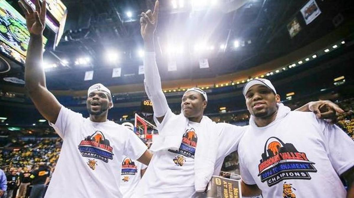 Wichita State’s Kadeem Coleby, Cleanthony Early and Tekele Cotton celebrate the 2014 MVC Tournament title.