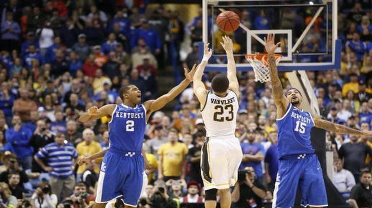 
Wichita State’s Fred VanVleet takes a shot in the final seconds against Kentucky in the 2014 NCAA Tournament. WSU lost 78-76 to Kentucky in St. Louis, ending WSU’s unbeaten season.
