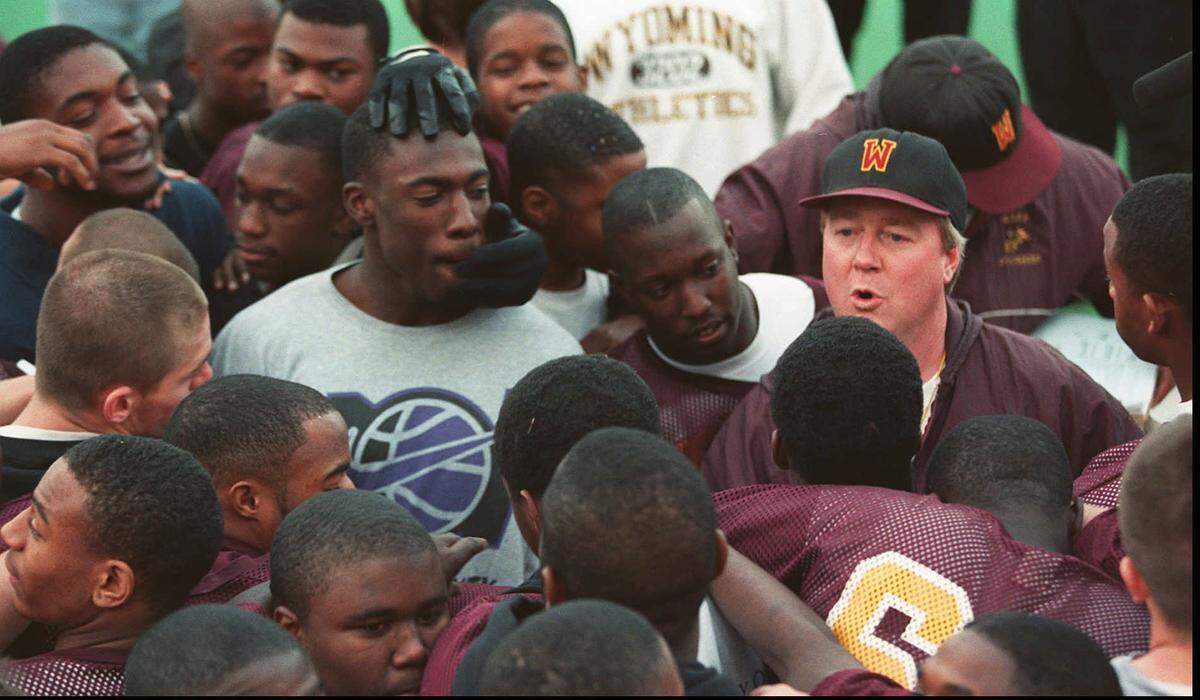 West football coach Weston Schartz talks with his team ahead of the 1997 Class 6A state championship game against Olathe North.