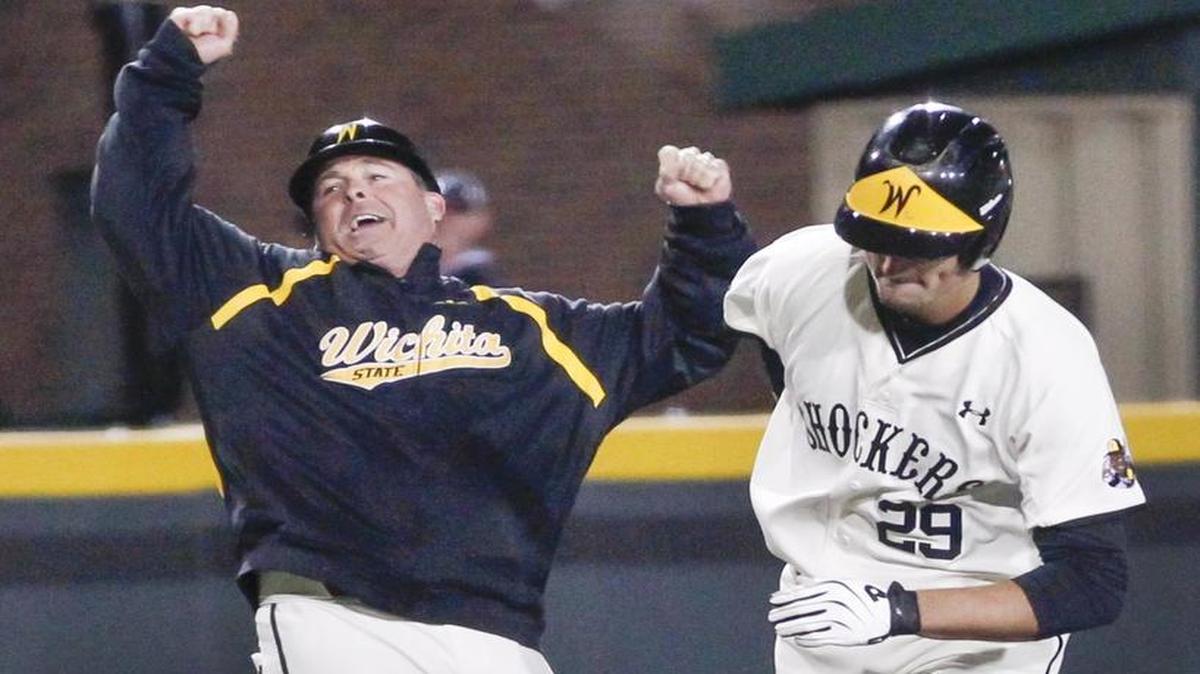
Wichita State coach Todd Butler rejoices as Sam Hilliard rounds third base after hitting a three-run homer in the eighth inning that helped the Shockers beat Illinois State 4-3 during the MVC Tournament on Wednesday at Eck Stadium. 
