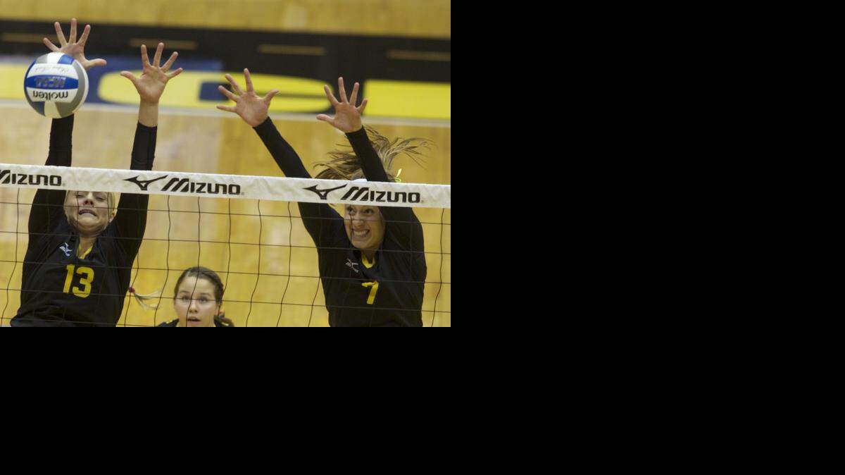 
Wichita State's Emily Hiebert and Katie Reilly go up for a block against Indiana State.

