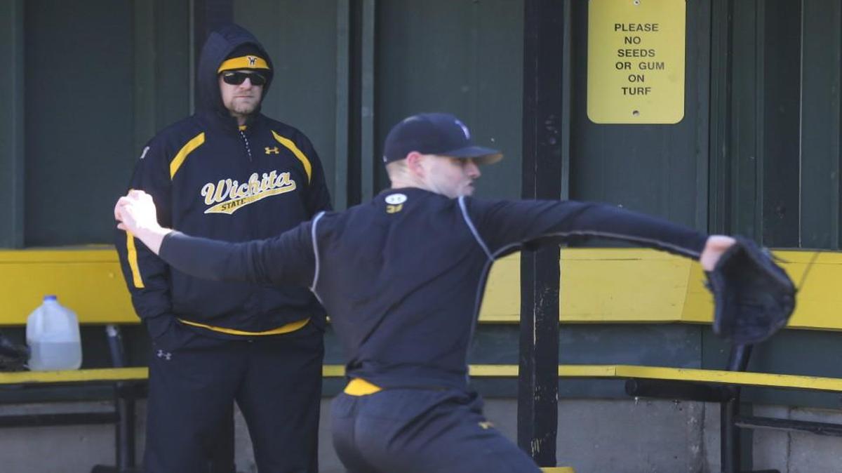 New Wichita State pitching coach Mike Steele watches junior left-hander Cody Tyler throw at Eck Stadium on Wednesday.