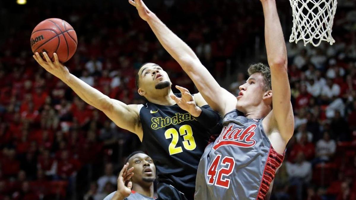 
Wichita State guard Fred VanVleet (23) shoots as Utah forward Jakob Poeltl (42) defends last season in Salt Lake City. The teams’ return game is Dec. 12 at Intrust Bank Arena.
