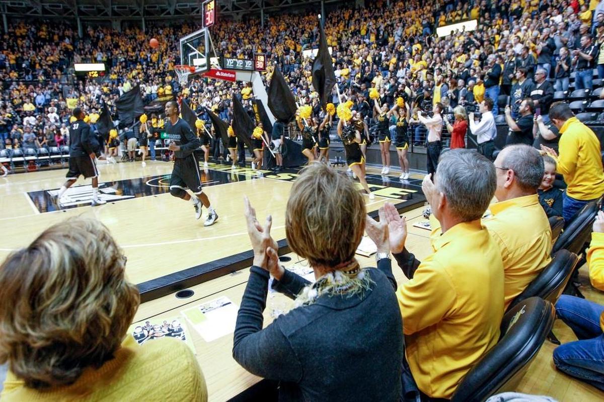 Shocker fans cheer as the players take the floor before last Saturday’s exhibition win over Hawaii Pacific. Wichita State plays its regular-season opener at Koch Arena on Friday night against Charleston Southern.