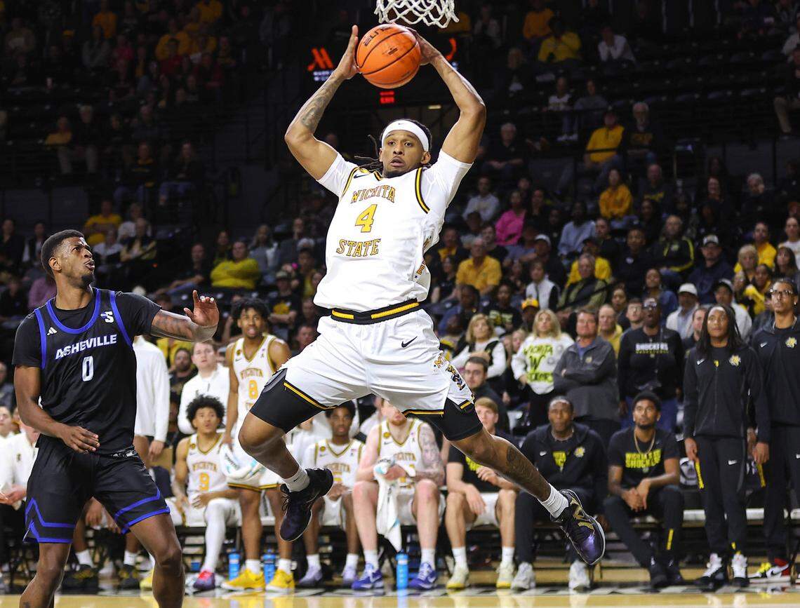 Wichita State redshirt freshman T.J. Williams grabs a rebound against UNC Asheville at Koch Arena.