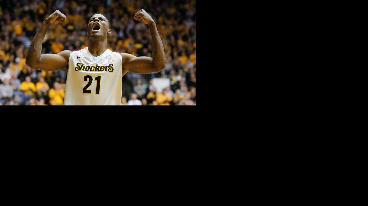 
Wichita State center Bush Wamukota celebrates a turnover against Northern Iowa on Feb. 28 at Koch Arena.
