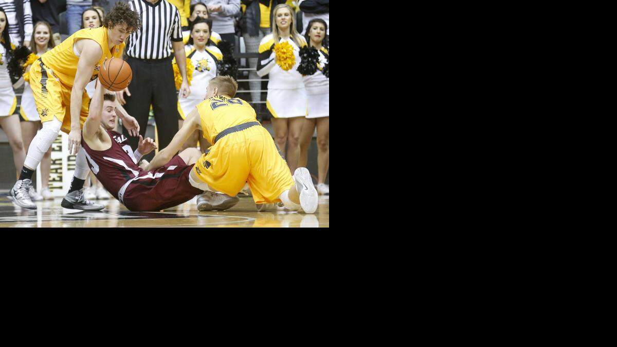 Wichita State's Evan Wessel, left, and Rauno Nurger pressure Southern Illinois' Sean O'Brien into a turnover in the second half Wednesday.