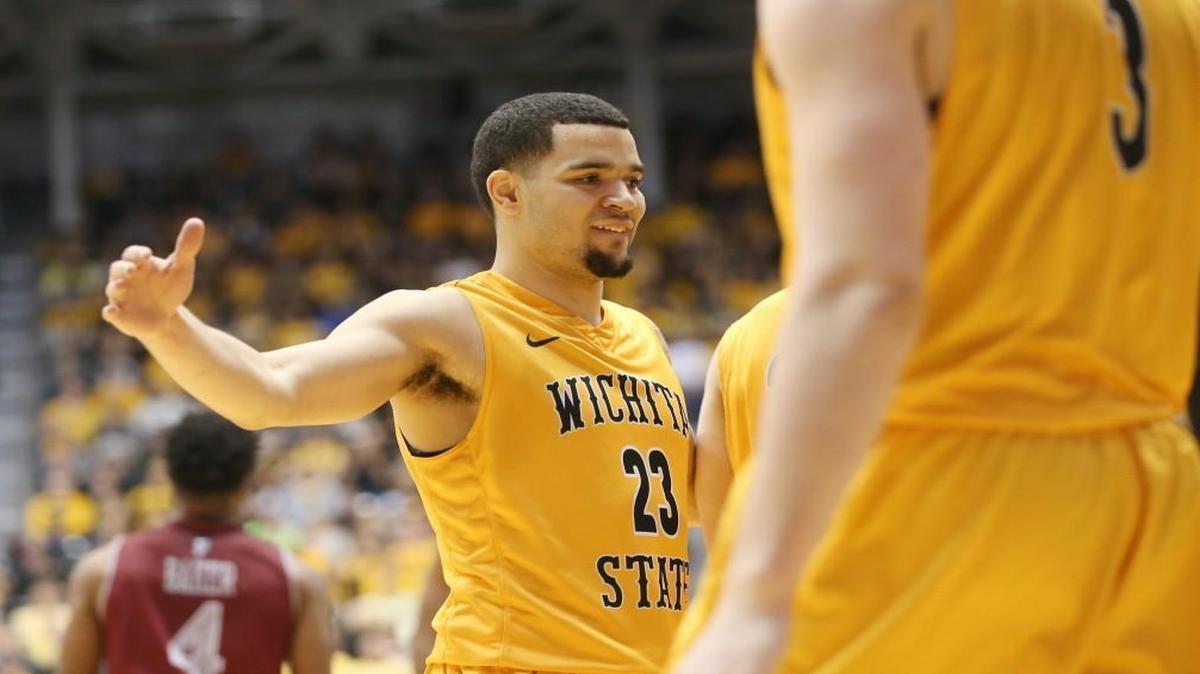 Wichita State's Fred VanVleet high-fives a teammate during their victory over New Mexico State on Monday.