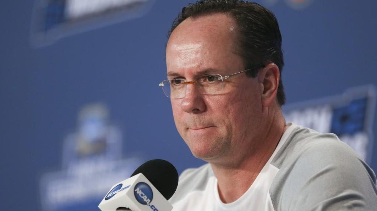 Wichita State coach Gregg Marshall takes question from reporters in Indianapolis in March. Marshall was one of the nearly 100 investors who lost more than $21 million in an alleged Ponzi scheme.