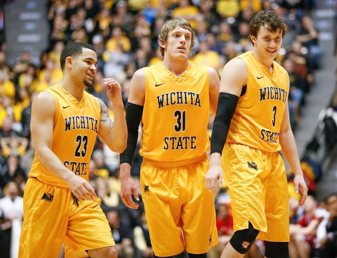 Wichita State’s Fred VanVleet, Ron Baker and Evan Wessel enjoy a moment during a 2016 men’s basketball game with Nike uniforms at Koch Arena. The Shockers are returning to Nike beginning with the 2025-26 season.
