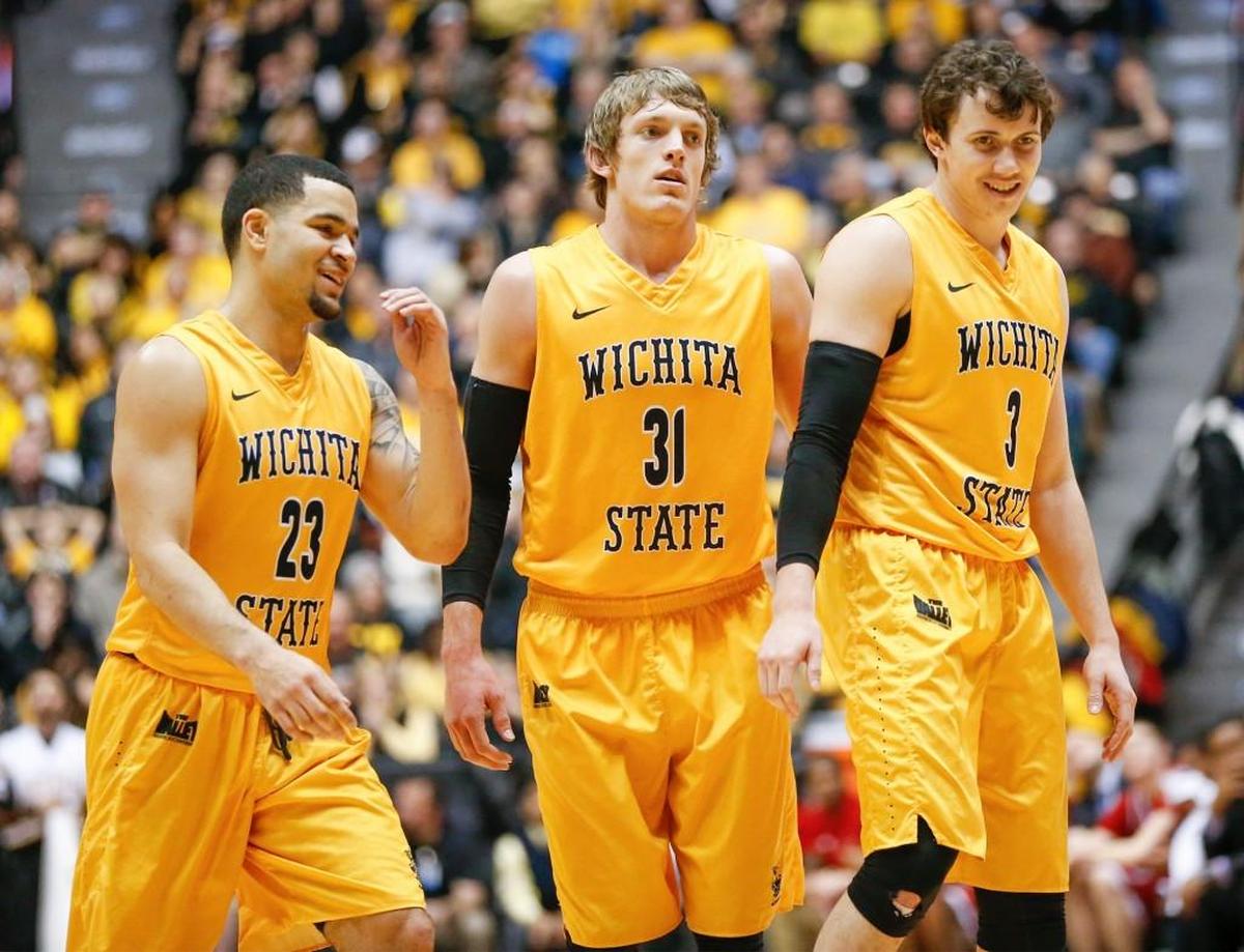 From left, Wichita State’s Fred VanVleet, Ron Baker and Evan Wessel enjoy a moment after forcing a turnover against Bradley during the second half at Koch Arena in January. (Jan 23, 2016)