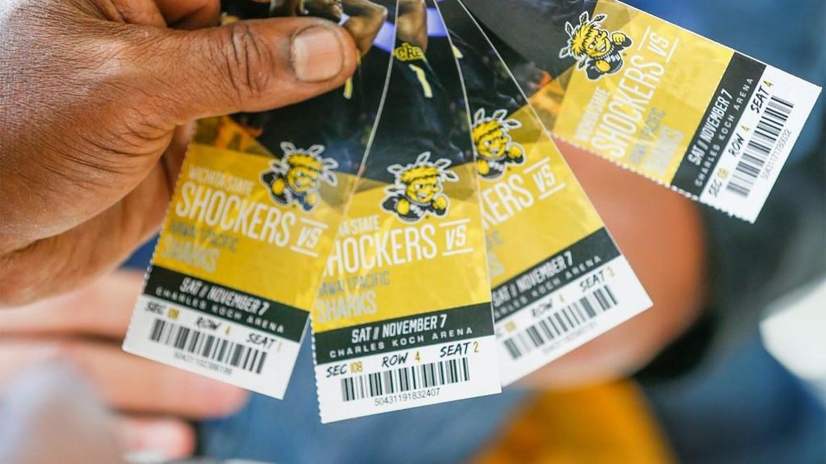 Shocker fans get their tickets scanned last season at Koch Arena.