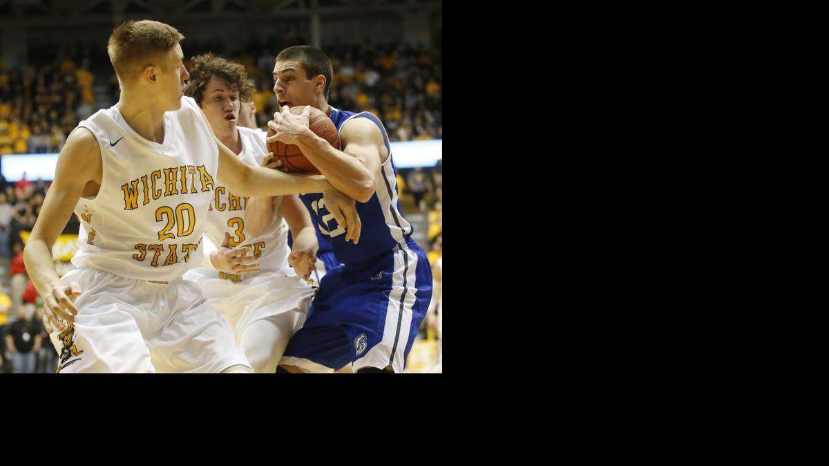 
Wichita State’s Rauno Nurger and Evan Wessel defend Drake's Reed Timmer on Sunday. (Jan. 25, 2015)
