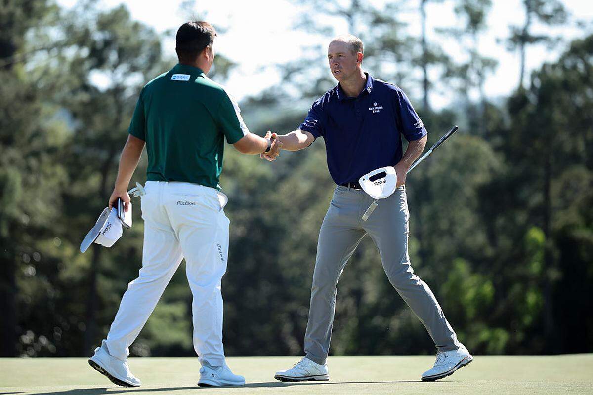 Wichita’s Sam Stevens shakes hands with playing partner Sungjae Im after their first round at the Masters on Thursday.