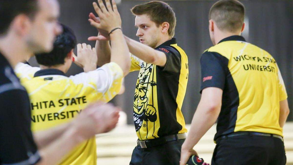 
Wichita State's Francoise Lavoie is greeted after rolling a strike against Lindenwood in the Intercollegiate Team Championships semifinal Friday at Northrock Lanes. WSU won and advances to Saturday's final.
