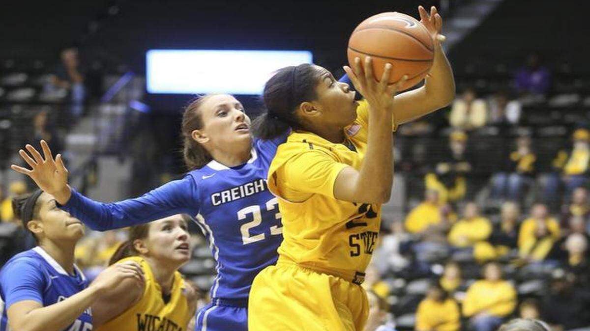 
Wichita State's Alex Harden shoots against Creighton's Marissa Janning (23) in the second half Saturday at Koch Arena. Harden scored 28 points on WSU’s win.
