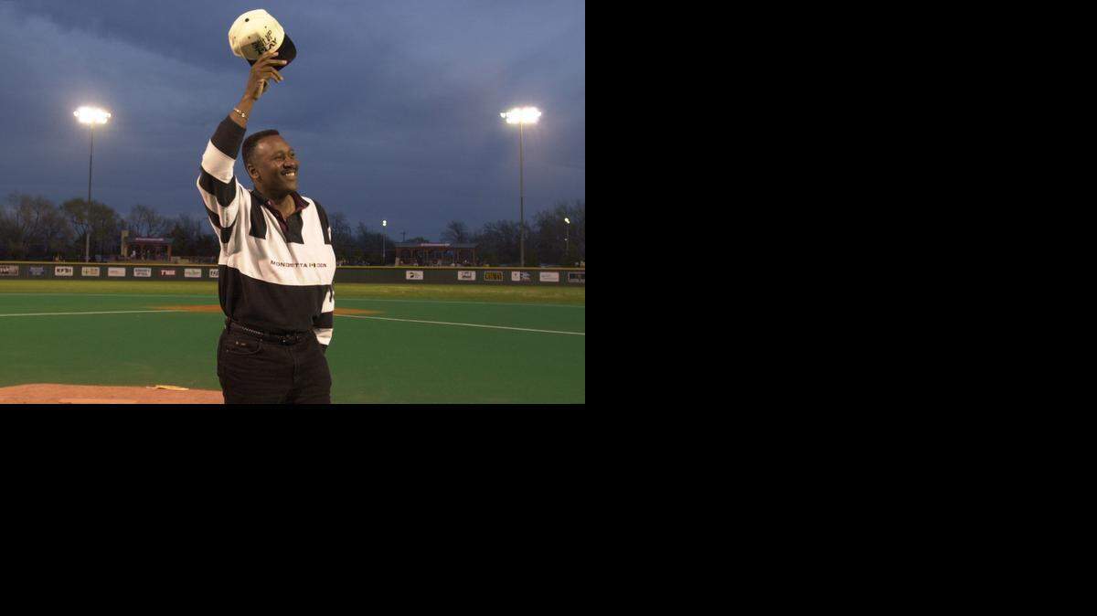 
Former WSU All-American Joe Carter waves to the crowd after throwing out the first pitch at a Shocker game.
