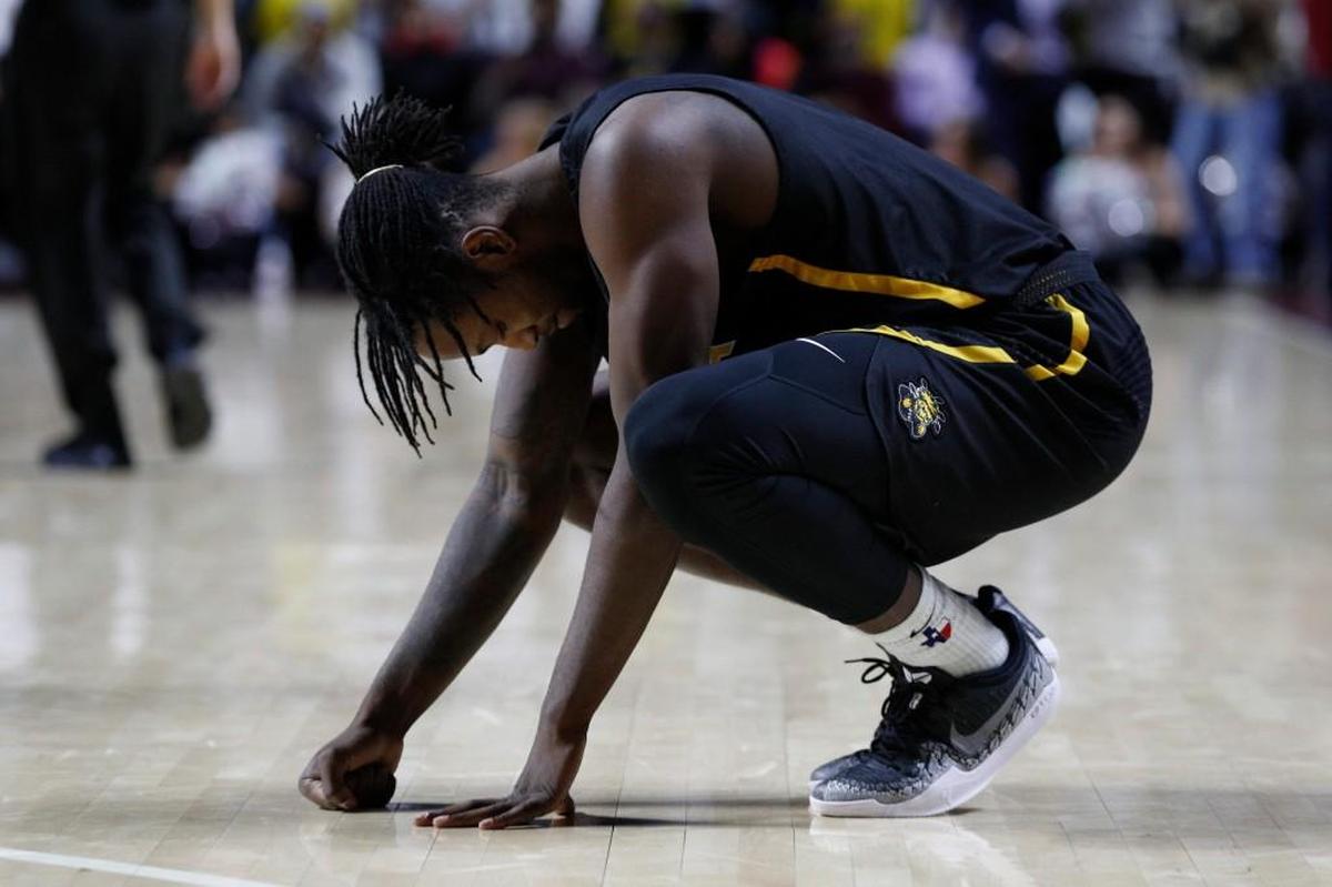 Wichita State’s Zach Brown reacts to missing the last shot in regulation against Temple on Thursday in Philadelphia. Temple won 81-79 in overtime.