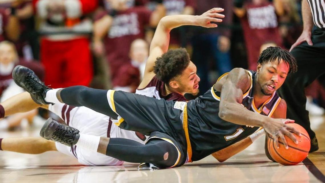 Wichita State forward Zach Brown fights for a loose ball against Missouri State last week. College coaches are becoming convinced that showing players examples of NBA players’ best techniques create good habits.