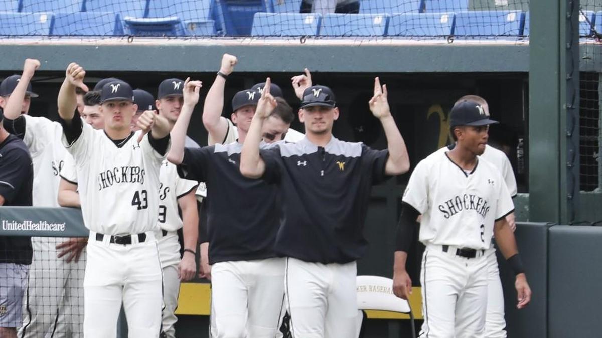 The Wichita State dugout celebrates a home run by Alec Bohm in the first inning of Sunday game against Southern Illinois at Eck Stadium.