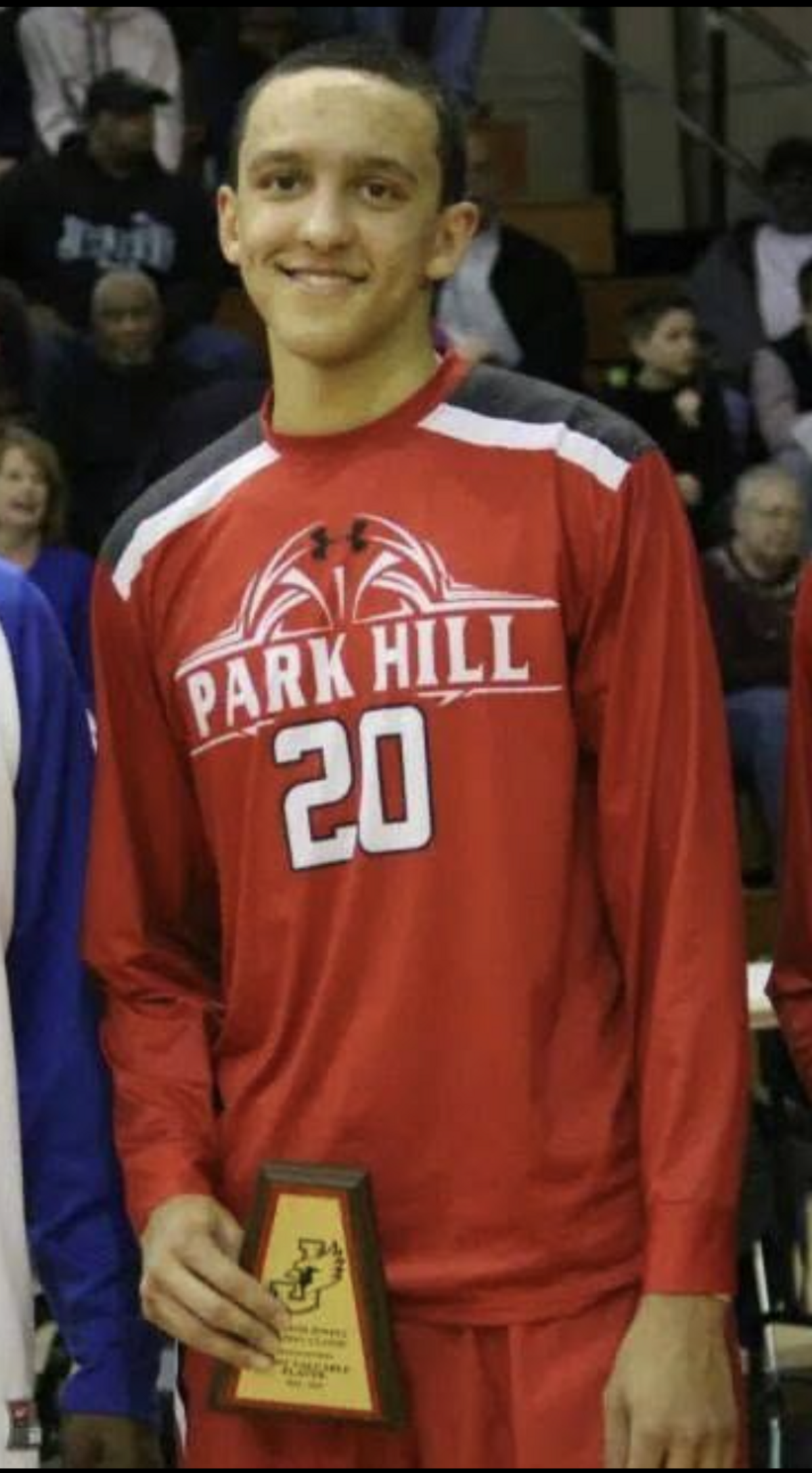 Landry Shamet poses for a photo at Park Hill High School after leading the Trojans to a district championship during his prep career.