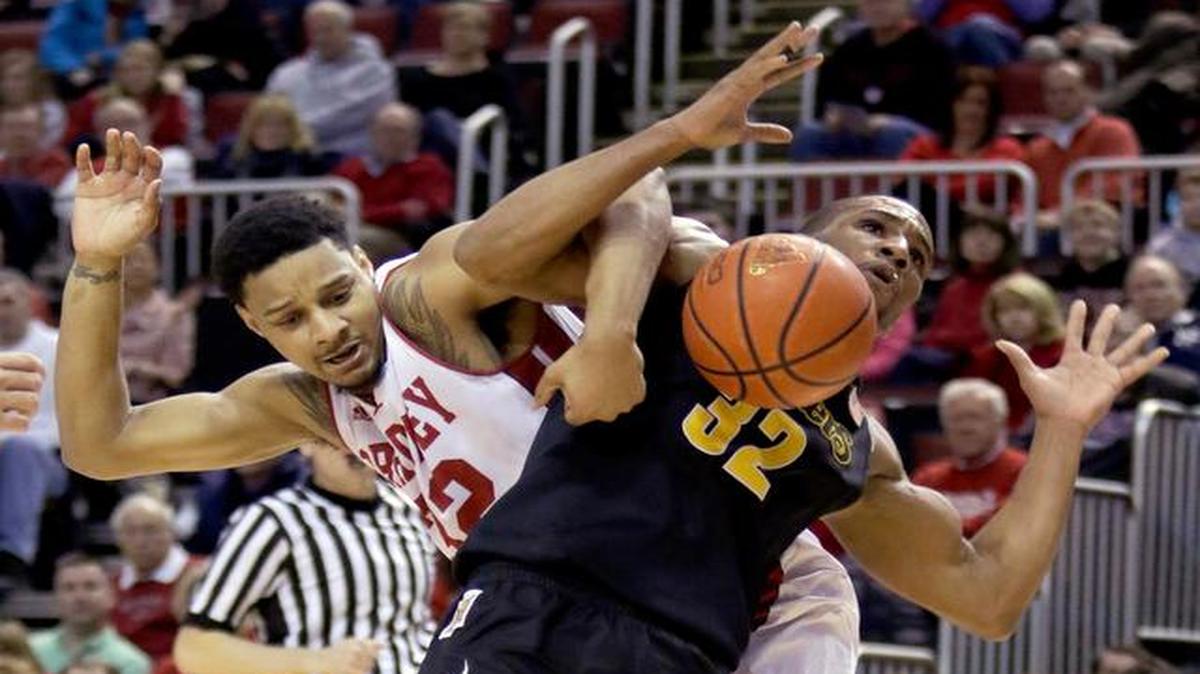
Wichita State guard Tekele Cotton, right, draws a foul from Bradley forward Mike Shaw during the first half Wednesday in Peoria, Ill.
