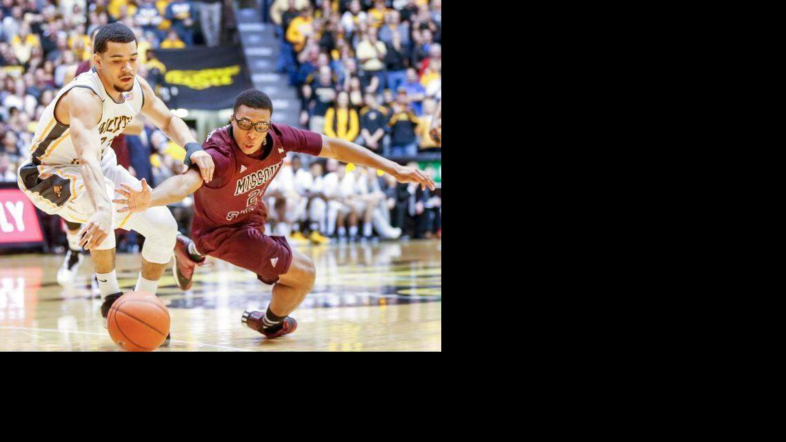 
Wichita State's Fred VanVleet steals the ball from Missouri State's Shawn Roundtree, Jr. in the first half at Koch Arena Saturday. (Feb. 7, 2015) 
