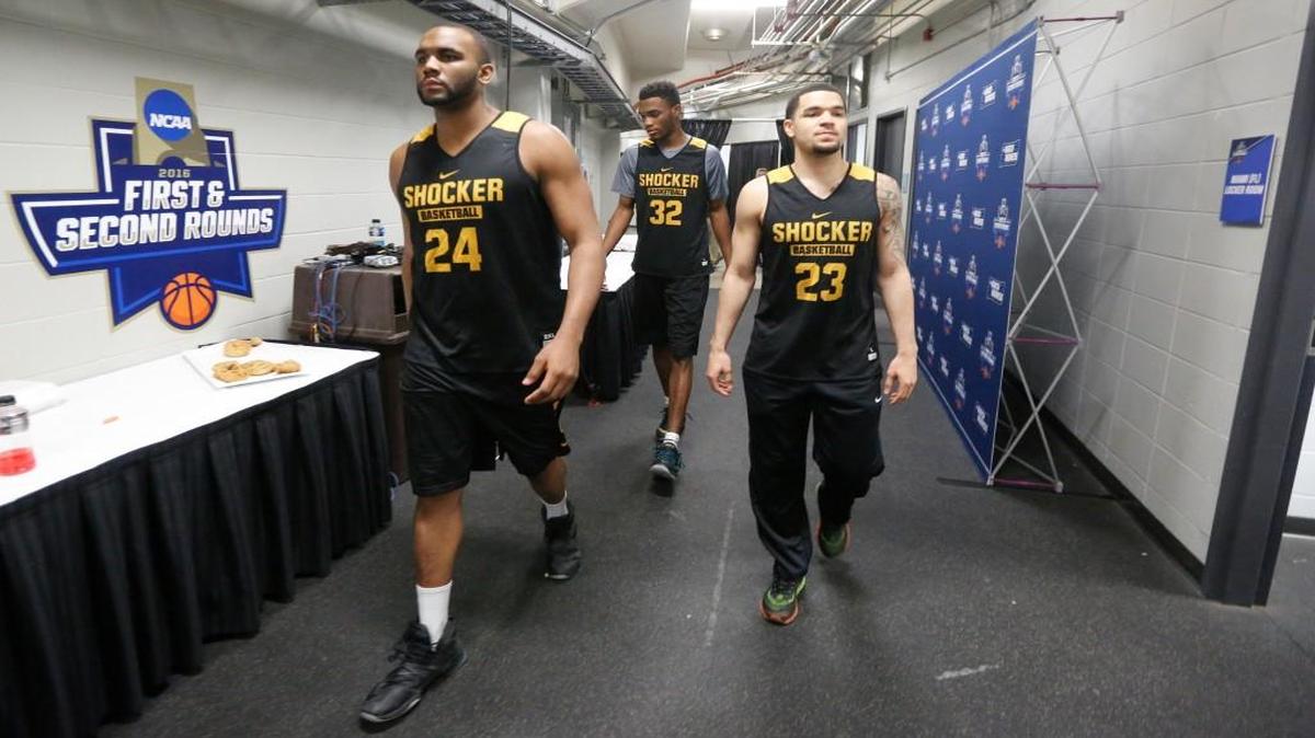 Shaq Morris, left, is one of the Shockers helping to fill the leadership void now that Fred VanVleet, right, is gone.