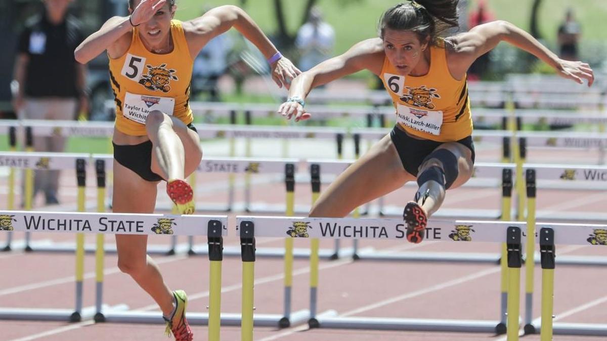Wichita State's Taylor Larch-Miller, left, and Nikki Larch-Miller run side-by-side in the 100-meter hurdles final Sunday at Cessna Stadium.