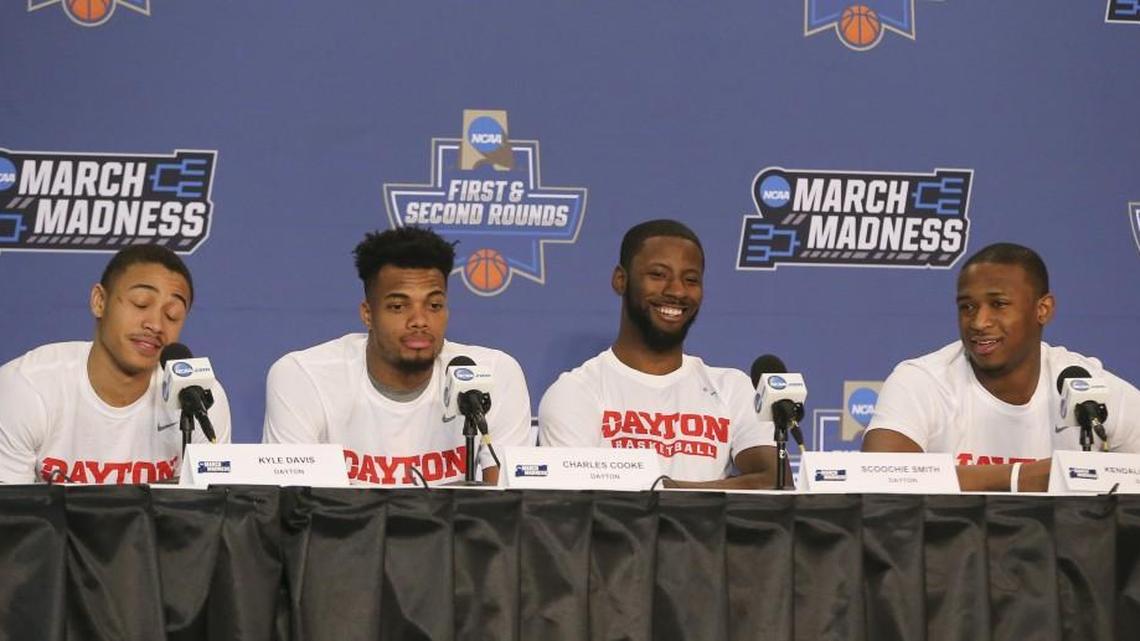 Dayton seniors Kyle Davis, Charles Cooke, Scoochie Smith and Kendall Pollard talk to the media Thursday in Indianpolis.