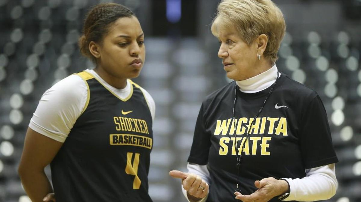 Coach Linda Hargrove talks with Diamond Lockhart before practice on Friday.