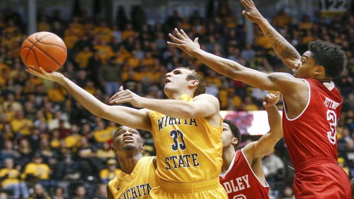 Wichita State’s Connor Frankamp drives to the basket against Bradley during the first half Saturday at Koch Arena.
