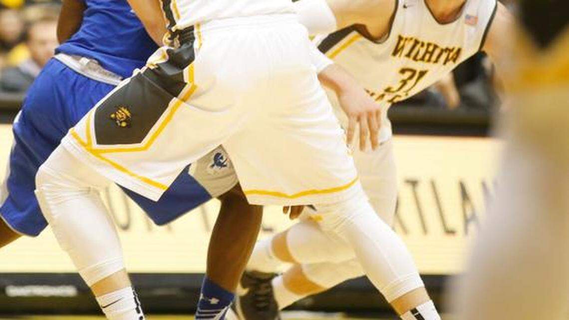 
Evan Wessel (3) and Ron Baker are two of the Shockers who choose to wear leggings. 
