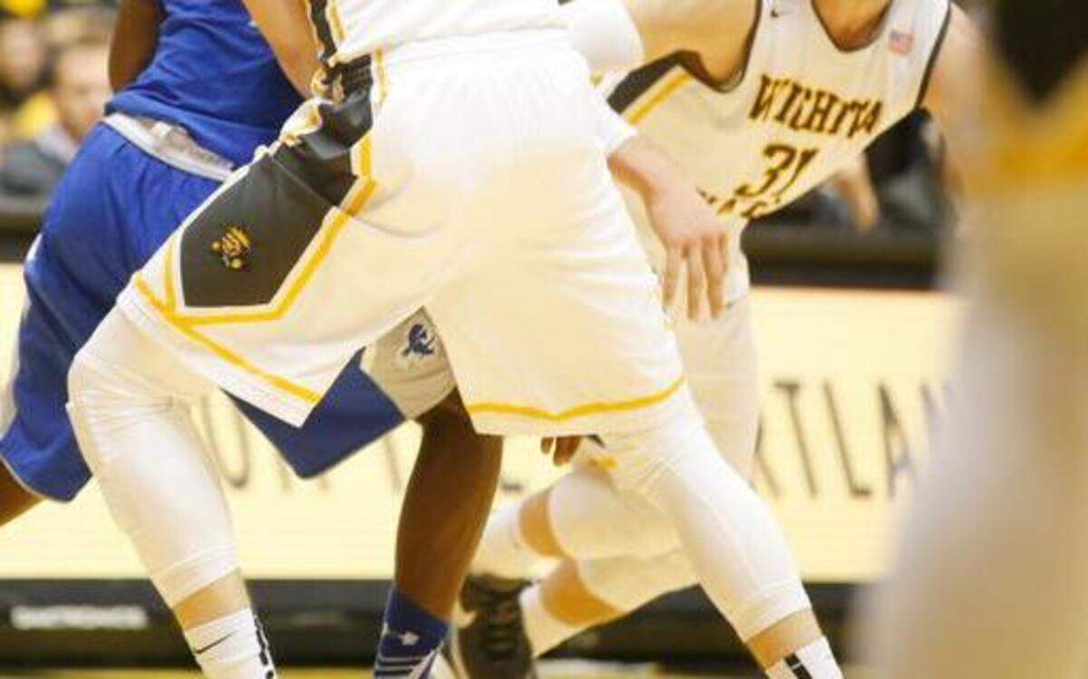
Evan Wessel (3) and Ron Baker are two of the Shockers who choose to wear leggings. 
