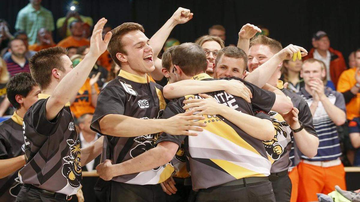 
The Wichita State bowling team hugs Stephen Cowland after his last frame as the Shockers won the Intercollegiate Team Championship Saturday at Northrock Lanes. WSU defeated Midland in three games. 

