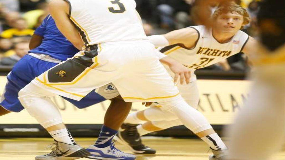 
Wichita State’s Evan Wessel (3) sets a ball screen on a Seton Hall player for Ron Baker in December’s game.
