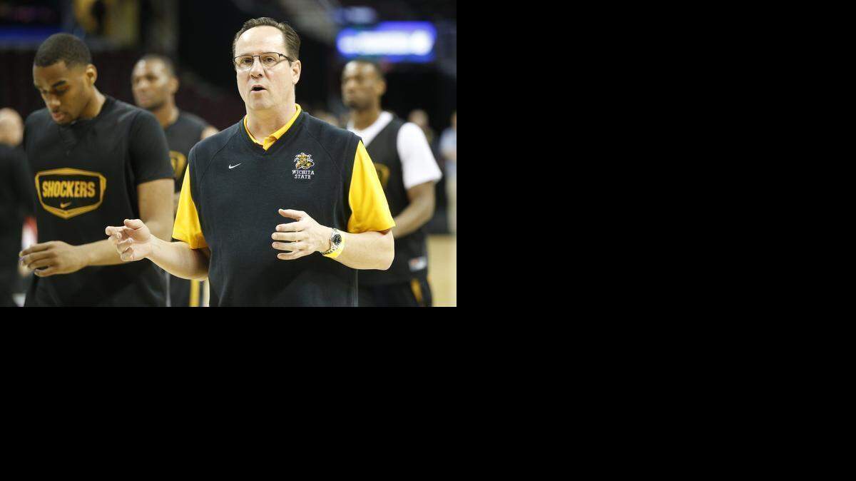 
Wichita State head coach Gregg Marshall works with his players during practice at QuickenLoans Arena in Cleveland last week. The Shockers lost in the Sweet 16 to Notre Dame. (March 25, 2015)
