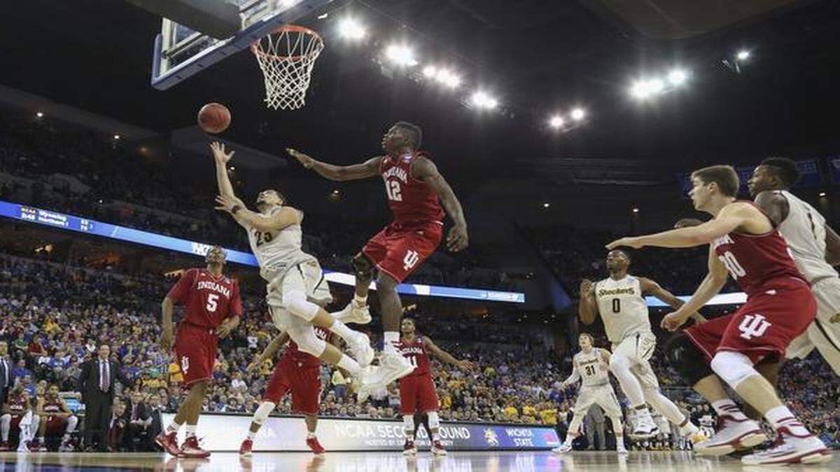 
Wichita State's Fred VanVleet goes to the basket against Indiana forward Hanner Mosquera-Perea during the first half of their game in Omaha on Friday.
