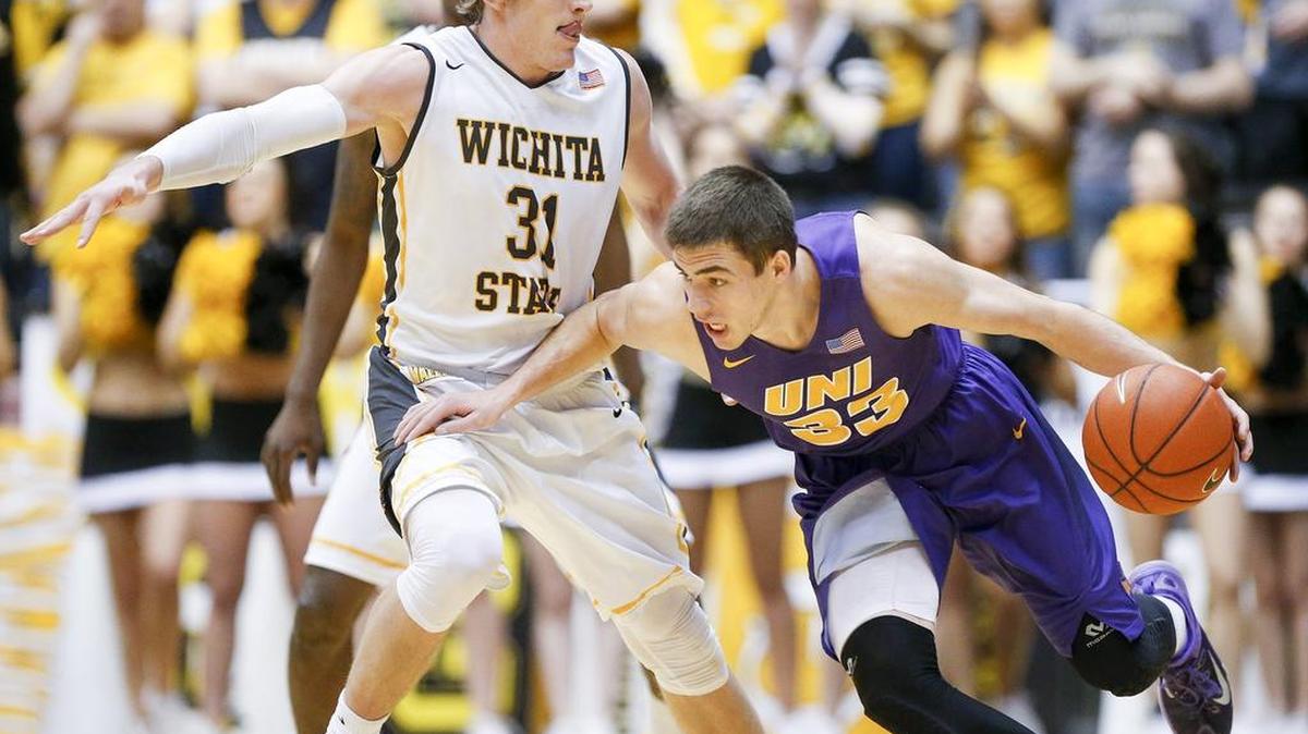 Northern Iowa’s Wyatt Lohaus (33) turns the corner on Wichita State’s Ron Baker during the second half at Koch Arena on Saturday. (Feb. 13, 2016)