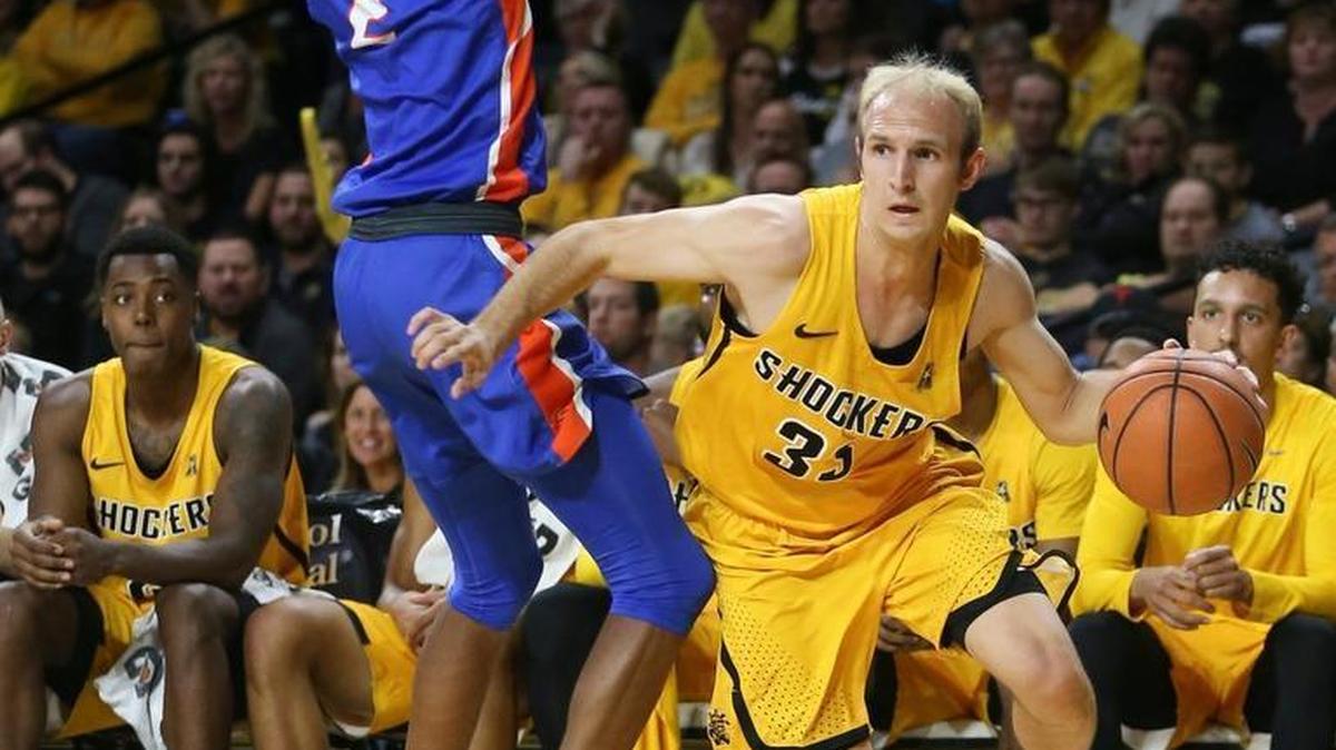 Wichita State guard Conner Frankamp dribbles around Savannah State forward Ralueke Orizu early this season at Koch Arena.