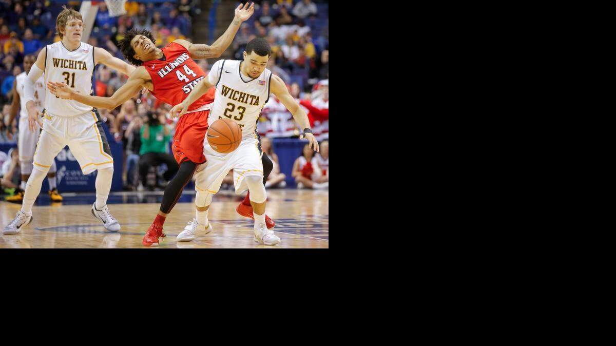 
Wichita State guard Fred VanVleet was called for a foul on Illinois State guard DeVaughn Akoon-Purcell while trying to steal the ball during the second half of their semifinal game at the Scottrade Center in St. Louis on Saturday.
