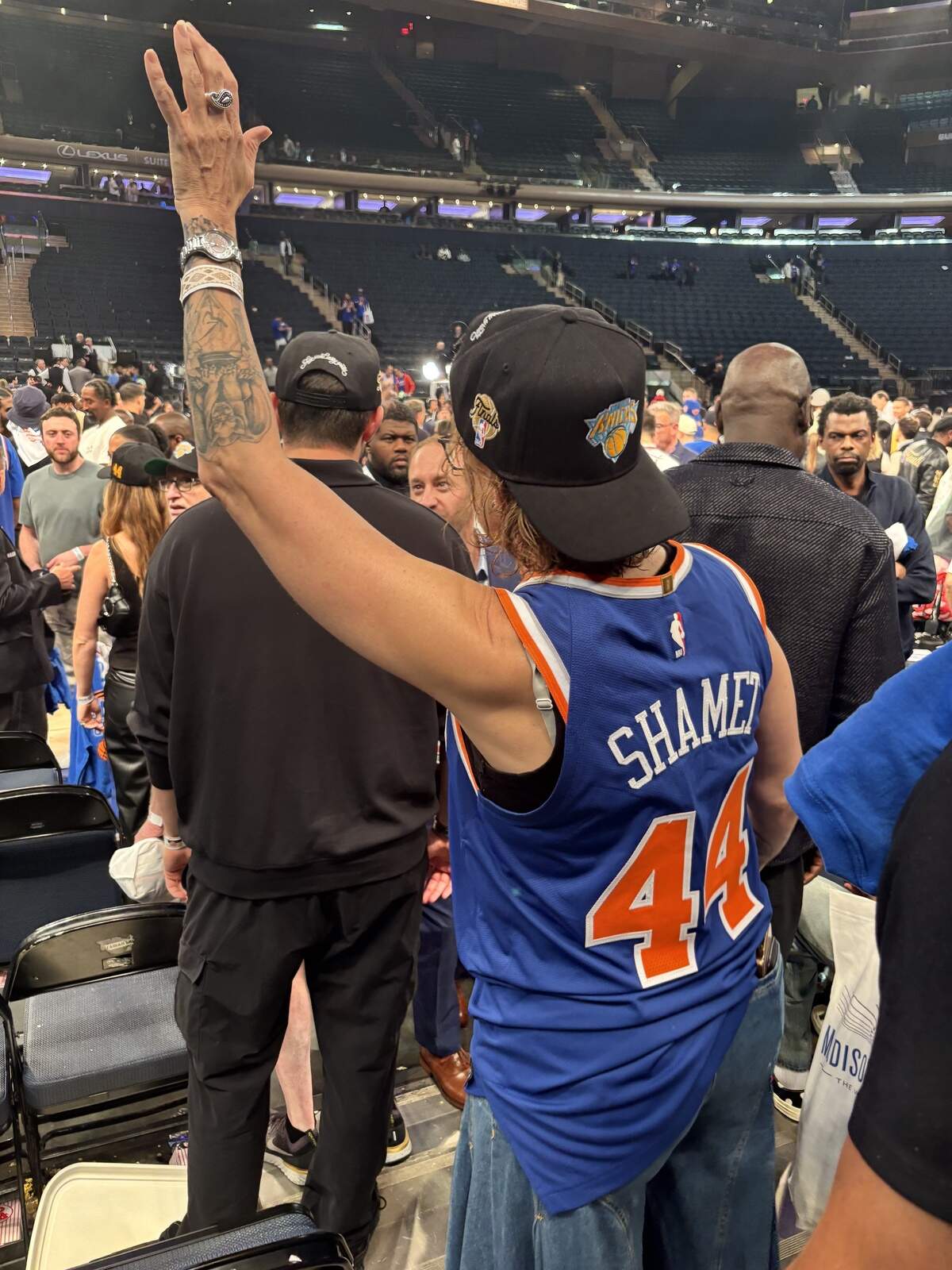 Melanie Shamet waves to her son, Knicks guard Landry Shamet, from the stands at Madison Square Garden after New York’s historic comeback win over the San Antonio Spurs in Game 4 of the NBA Finals on Wednesday.
