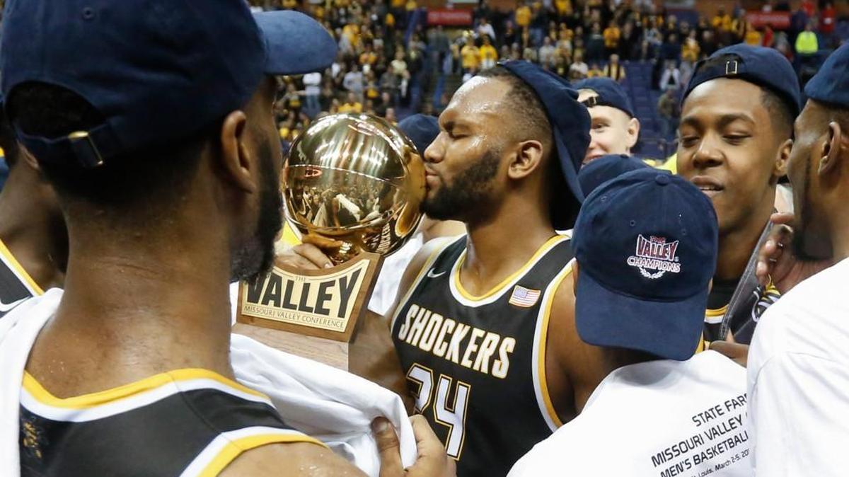 Wichita State’s Shaq Morris and his teammates react after winning the Missouri Valley Conference Tournament win a win a 71-51 win over Illinois State earlier this month in St. Louis.