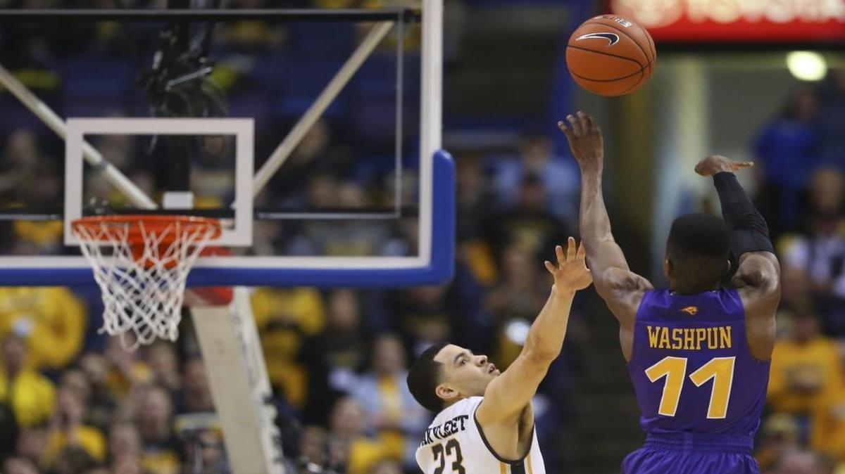 Wichita State guard Fred VanVleet defends Northern Iowa guard Wes Washpun during the first half Saturday at the Scottrade Center in St. Louis.